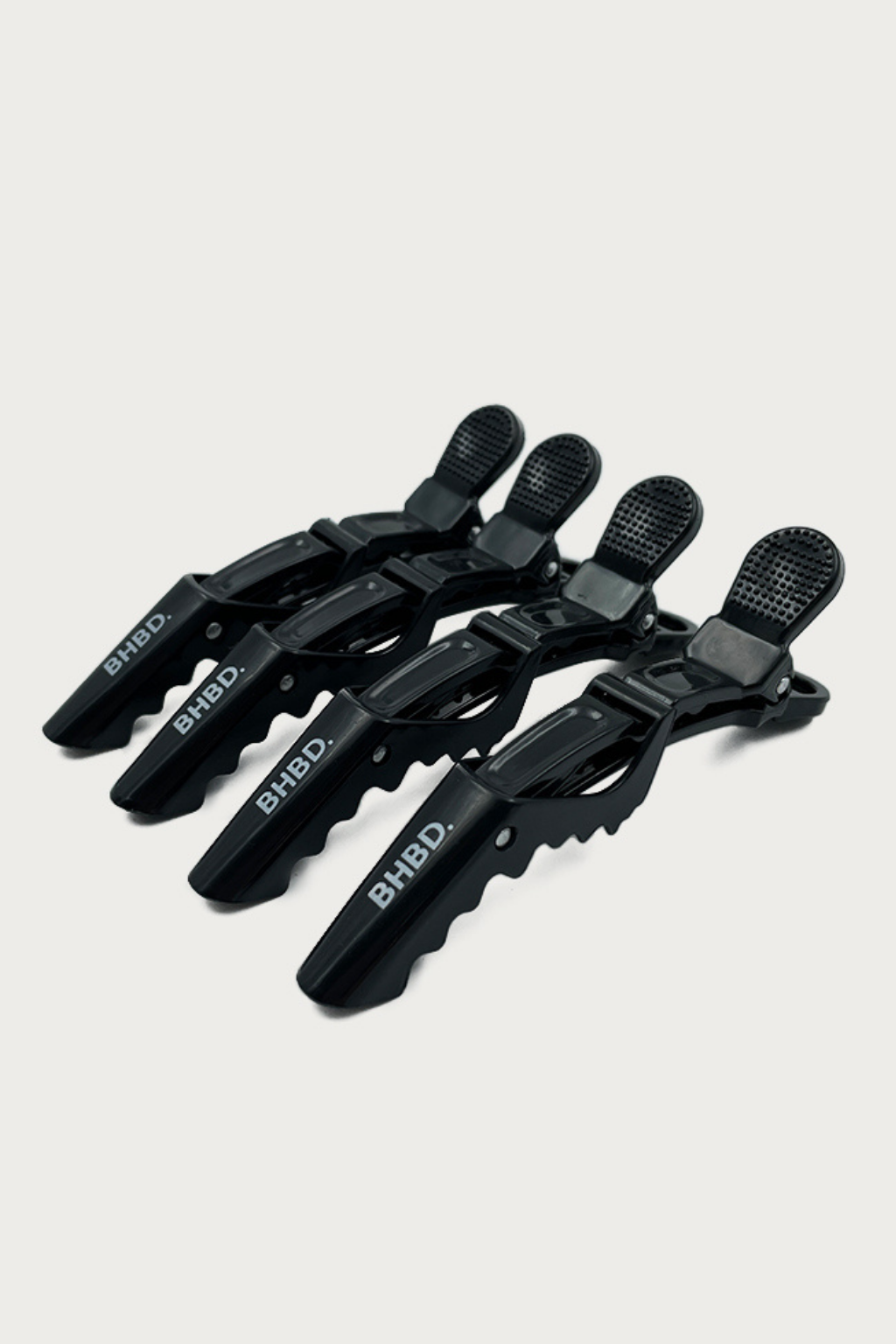 4-pack hair clips for sectioning hair.