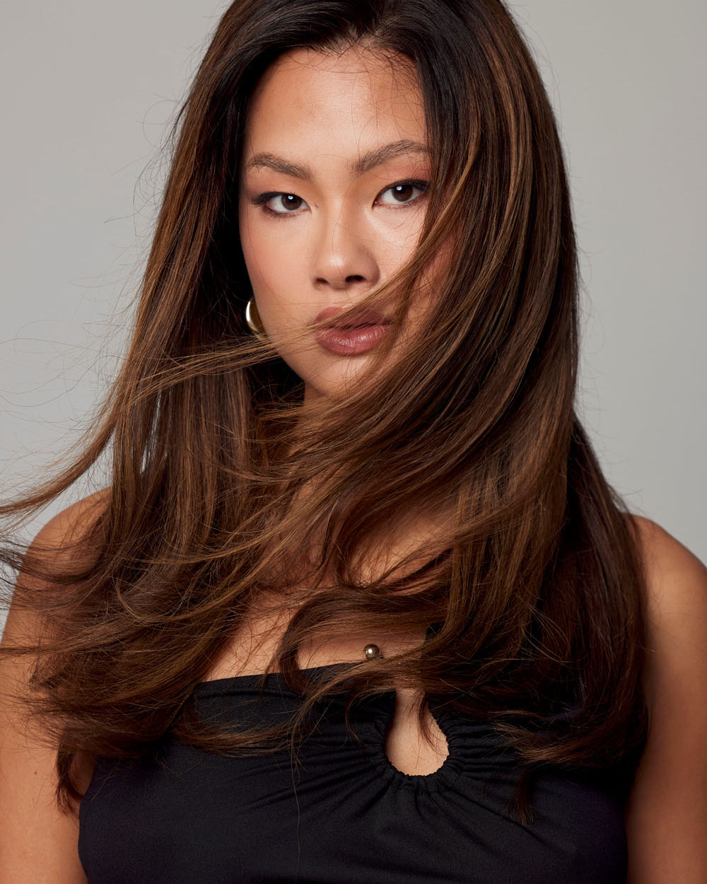 Model wears BHBD Silent Siren wig: 40 cm, dark brown to warm medium brown with highlights. Hand-tied real hair, natural hairline. 100% Remy human hair of the highest quality.